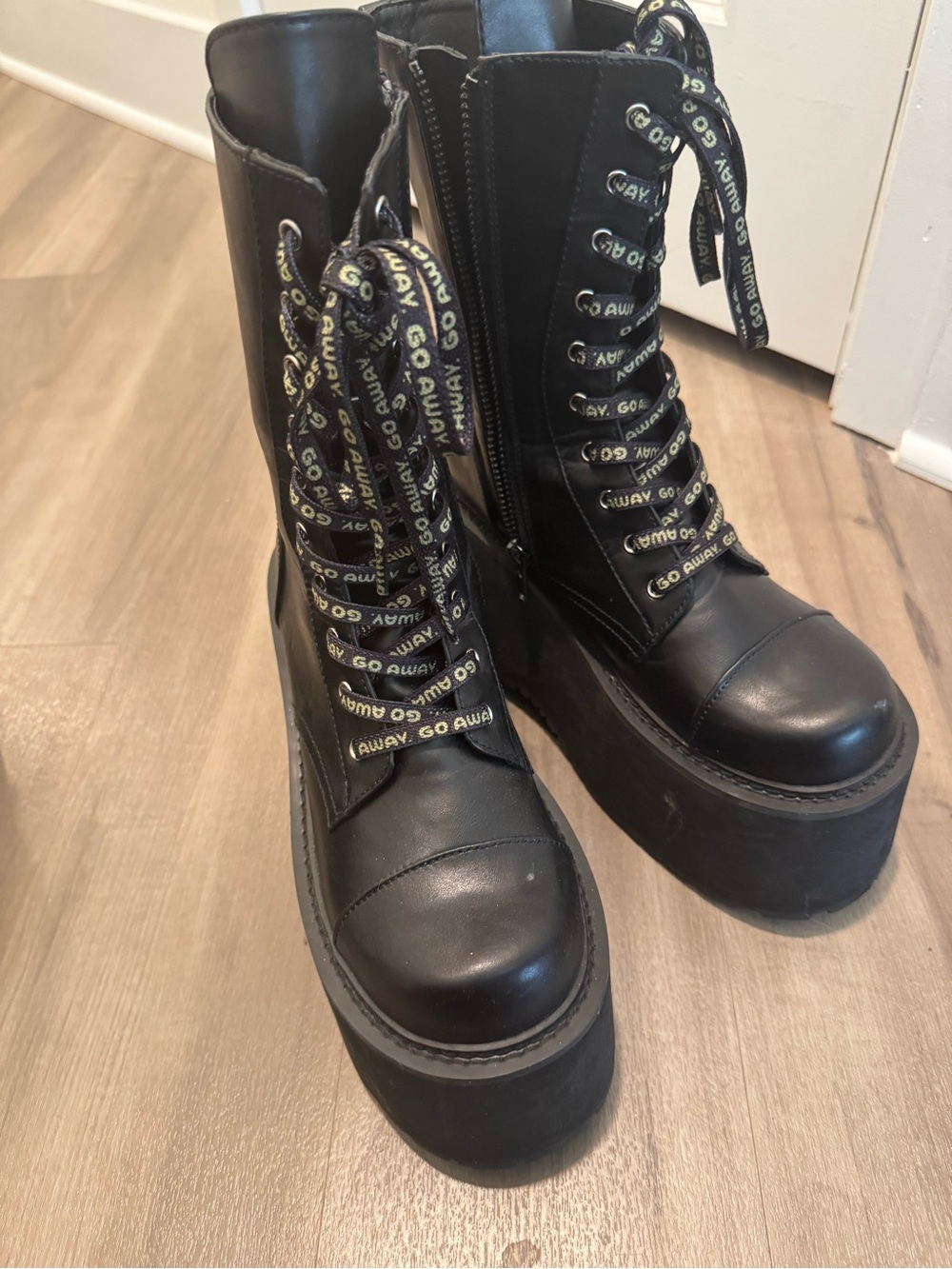 Dolls Kill Daria collab Black Platform Combat Boots with Logo Lace Detail